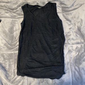 Black tank top/ shirt.